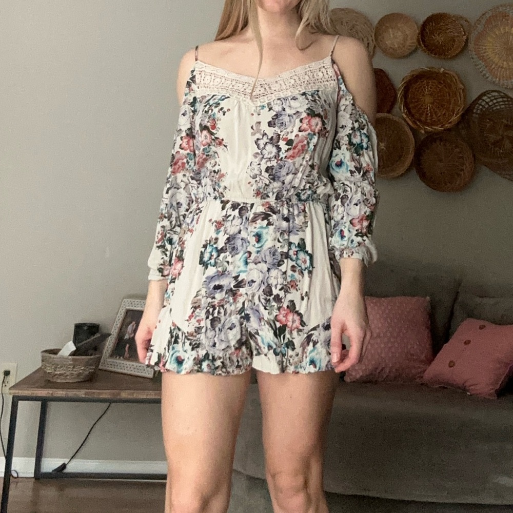 Floral romper cut out shoulders size small